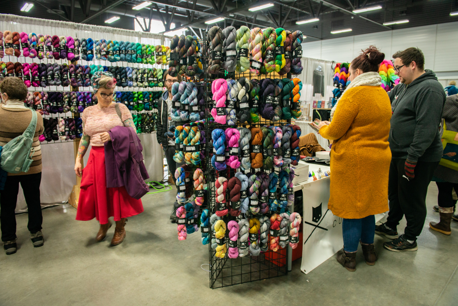 The brilliant rare colours of Black Cat custom yarns are on display in their booth